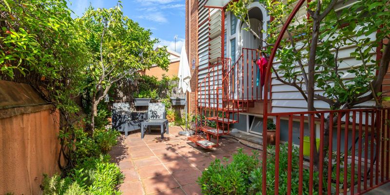 Jardí privat de la casa adossada a l'Eixample de Sant Cugat, disponible a Amat immobiliaris. FOTO: Cedida